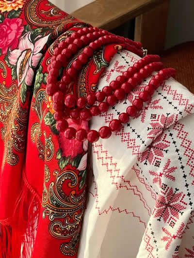 Traditional Russian dress with kokoshnik headpiece, intricate embroidery