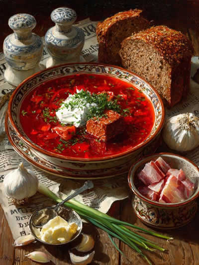 Traditional Russian food: golden pancakes and sweet treats on rustic table