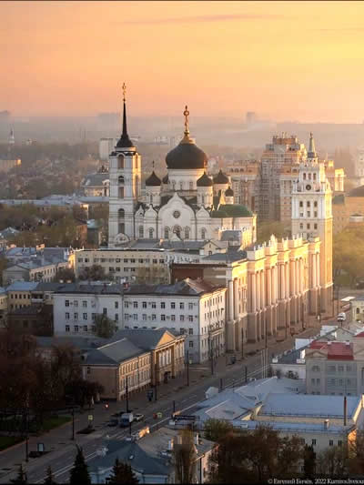 Admiralty Square in Voronezh with monument and city life during summer evening
