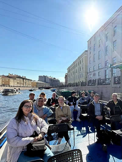 Students on a boat trip St. Nicholas in St Petersburg, Russia