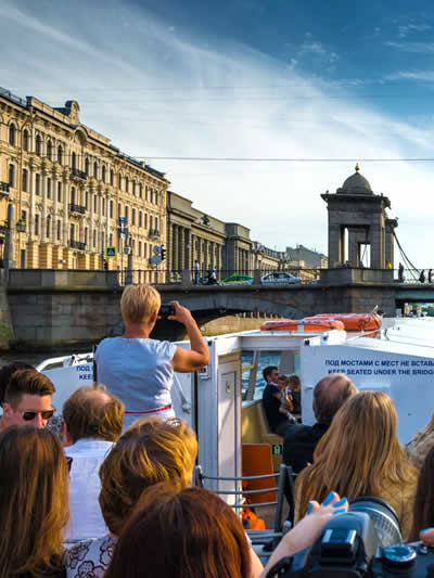 Students on a boat trip in St Petersburg, Russia