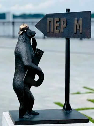 Perm, Russia. A humorous black metal sculpture of a bear standing upright on its hind legs.